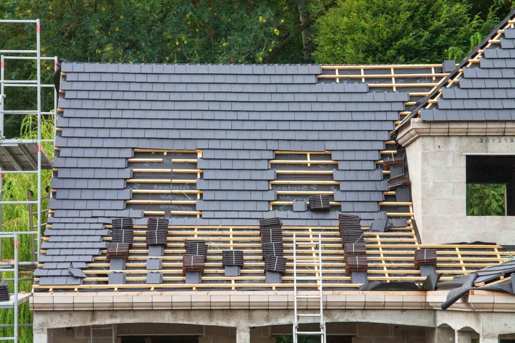 Slate roof installation in progress