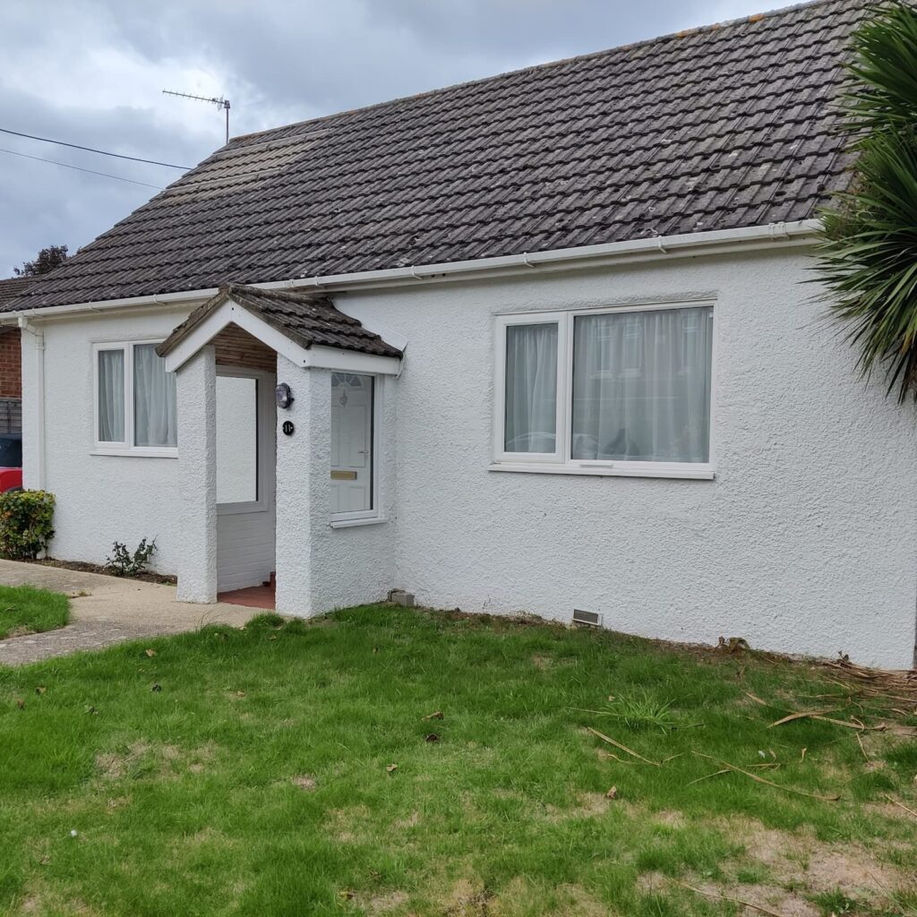 Freshly rendered and painted bungalow exterior